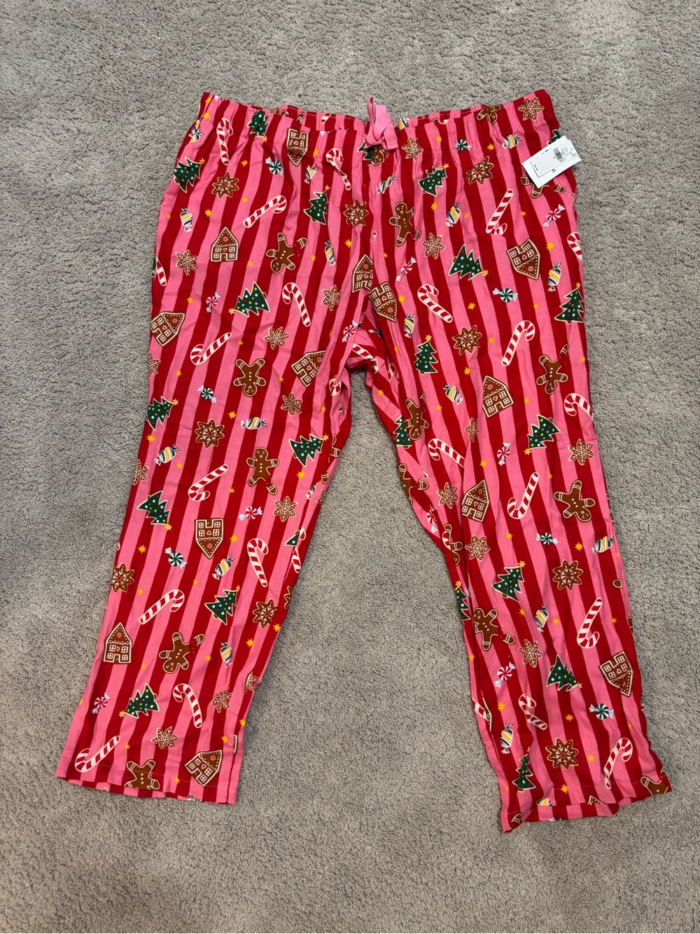Women’s plus sized Holiday Pink Stripe Pajama Pants with Candy Cane Print